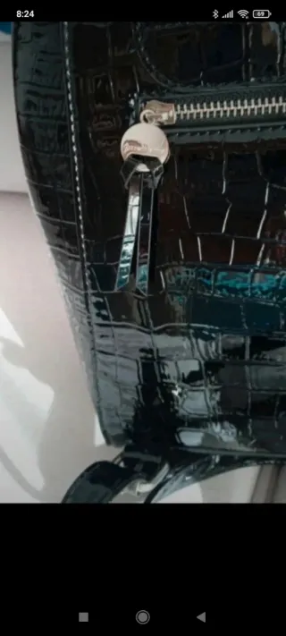 Mochila Stradivarius negra efecto piel
