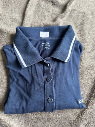 Polo Reebok azul slim fit
