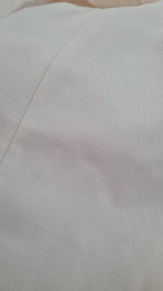 Traje de flamenca beige con volantes