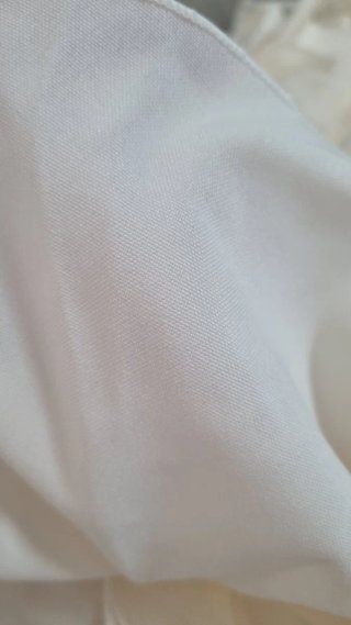 Traje de flamenca beige con volantes