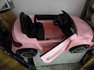 Coche eléctrico rosa para niños
