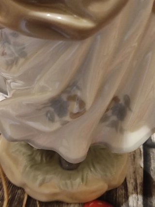 Figura Lladro porcelana niña con pájaro