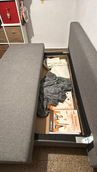 Sofá cama gris plegable como nuevo