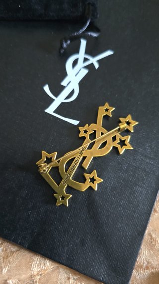 Spilla Saint Laurent oro con stelle