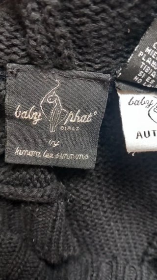 Gilet nero con chiusura a alamaro