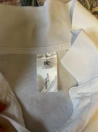 Polo bianca con logo stampato