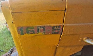 Tractor Ebro 160-E y cultivador 10 brazos y rastra