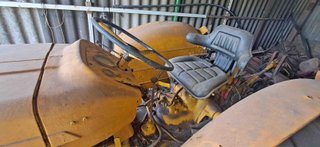 Tractor Ebro 160-E y cultivador 10 brazos y rastra