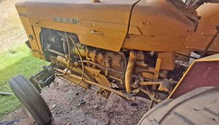 Tractor Ebro 160-E y cultivador 10 brazos y rastra