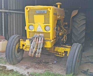 Tractor Ebro 160-E y cultivador 10 brazos y rastra