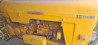 Tractor Ebro 160-E y cultivador 10 brazos y rastra