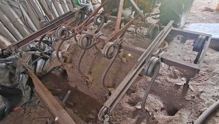 Tractor Ebro 160-E y cultivador 10 brazos y rastra