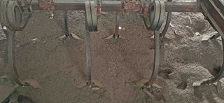 Tractor Ebro 160-E y cultivador 10 brazos y rastra