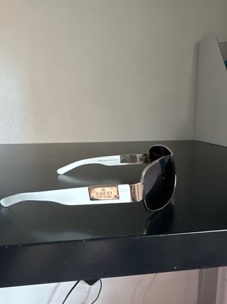 Occhiali da sole Gucci bianchi e argentati
