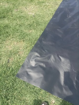 Lona negra para jardín