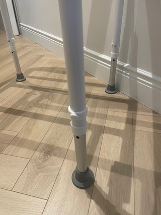 Silla de ducha plegable blanca