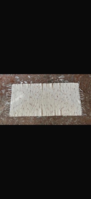 Alfombra blanca con detalles