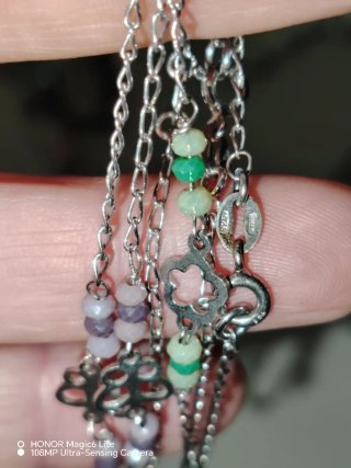 Tre bracciali argento con granelli colorati