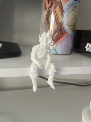 Figura Goku sentado