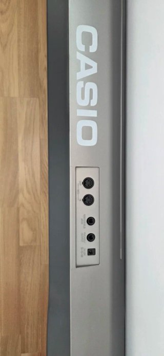 Teclado Casio LH-80 con soporte.