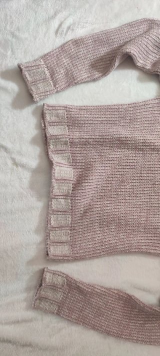 Jersey de punto cuello alto rosa y beige