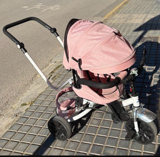 Triciclo niña rosa.
