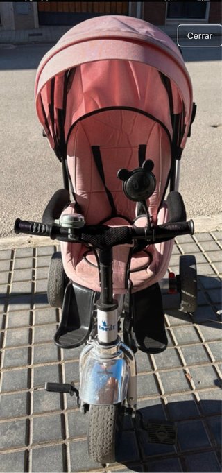 Triciclo niña rosa.