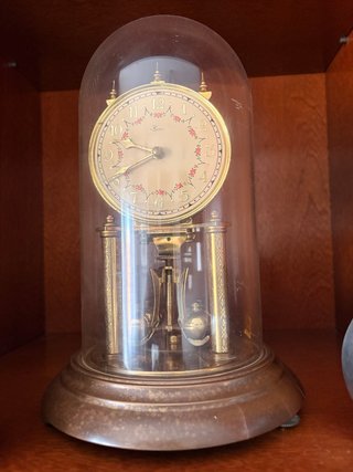 Reloj de aniversario con péndulo para reparar