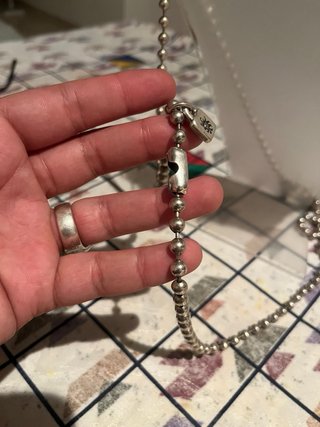 Collar plateado con corazón y perla