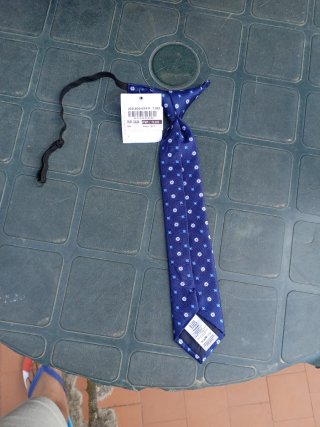 Corbata infantil azul con estampado floral