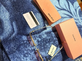 Gafas de sol Miu Miu doradas y rosas