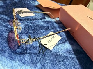 Gafas de sol Miu Miu doradas y rosas