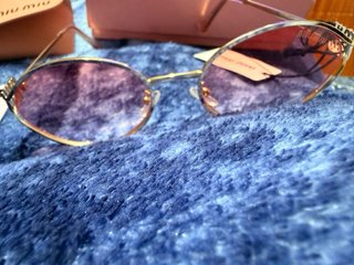 Gafas de sol Miu Miu doradas y rosas