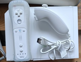 Nintendo Wii + Wii Fit Plus + 2 Juegos