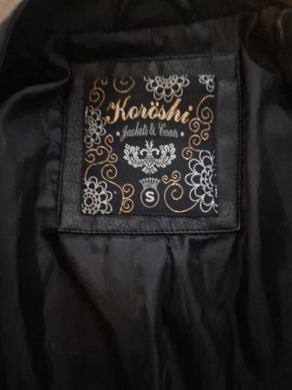 Cazadora bomber chica con flores bordadas Usada 1