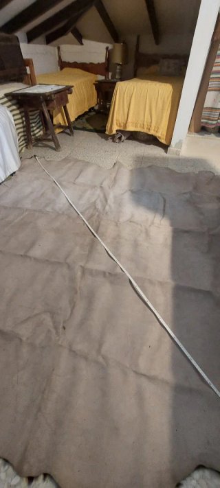 Piel de vaca auténtica marrón, negra y blanca
