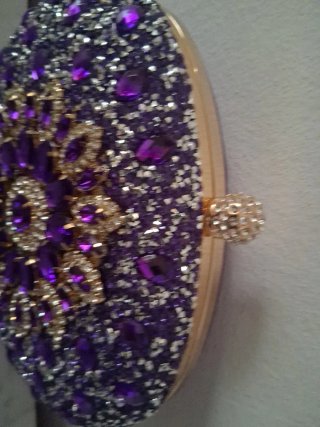 Bolso de fiesta morado y dorado