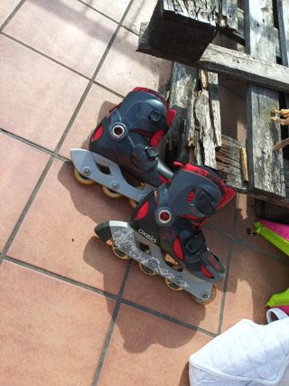 Patines Oxelo Negros y Rojos talla 34-36.