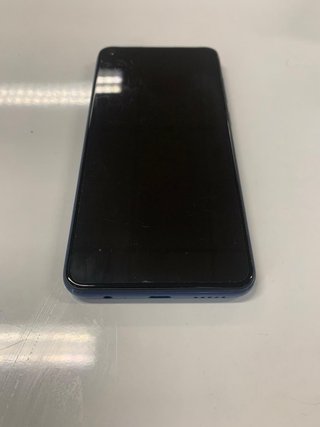 Xiaomi Redmi Note 9 con custodia rosa inclusa