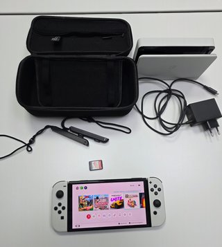 Nintendo Switch OLED Blanca juego Ring Fit Adventu