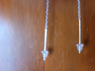 Pendientes cadena alas de ángel plateados