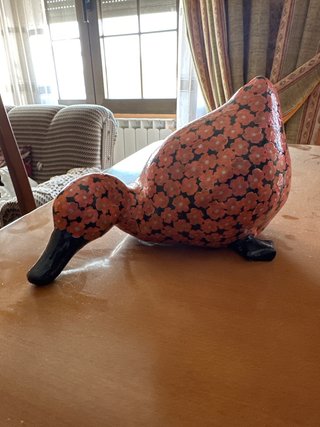 Pato decorativo con flores