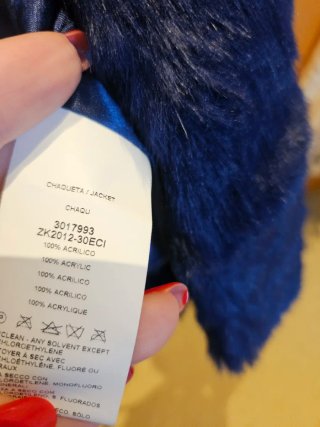 Abrigo corto de pelo azul