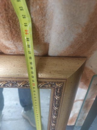 Espejo decorativo dorado con marco de madera