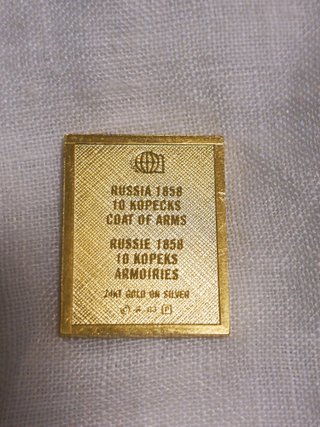 sello ruso de oro y plata