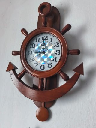 Reloj de pared de madera náutico
