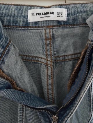 Jeans baggy con cinturón