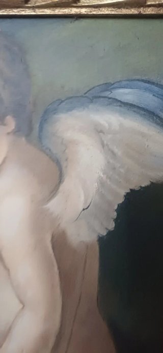Cornice dorata con dipinto putto e arco