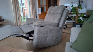 Sillón reclinable gris tela