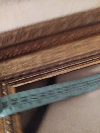 Cornice in legno dorato